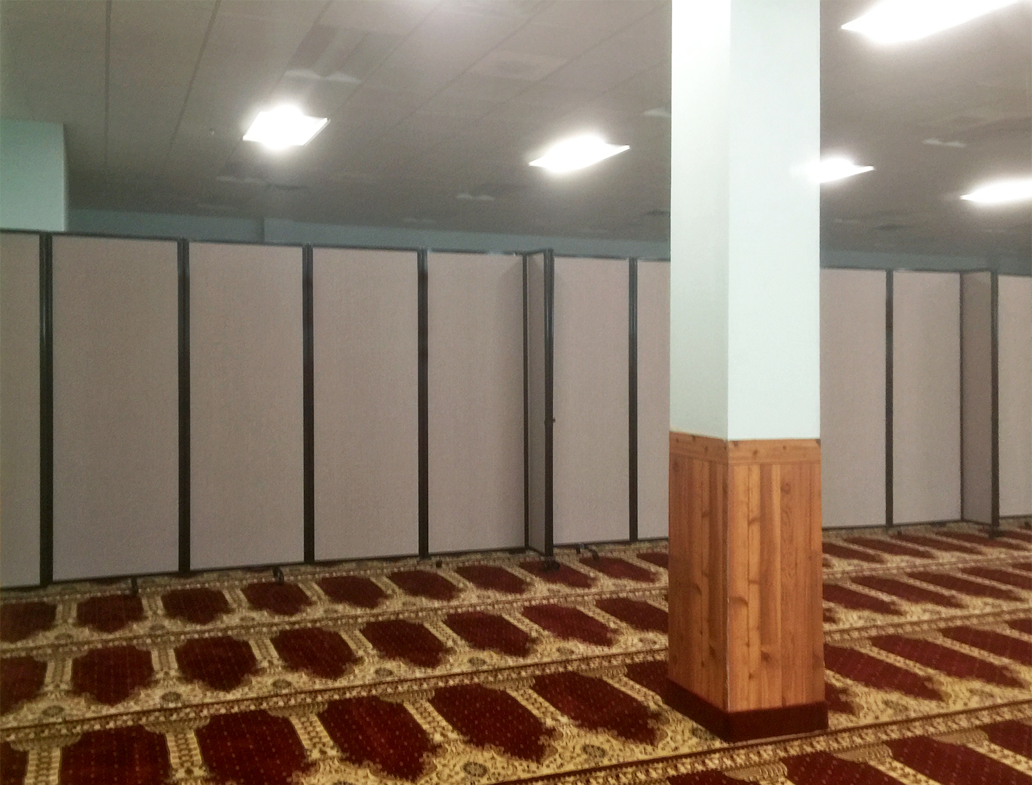 Portable partition featured in place of worship.